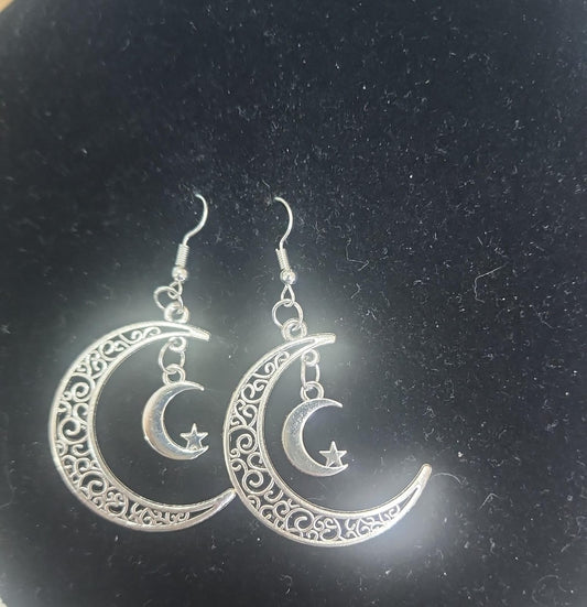 Aretes luna calada con estrella