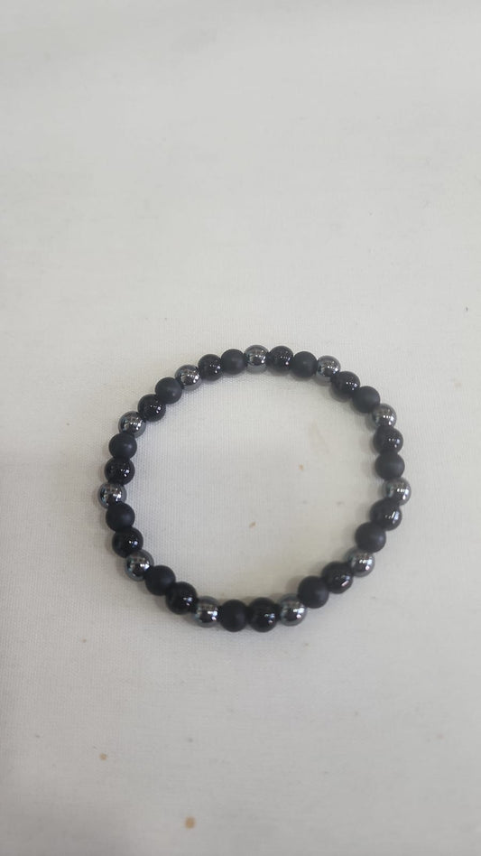 Pulsera negra de triple proteccion